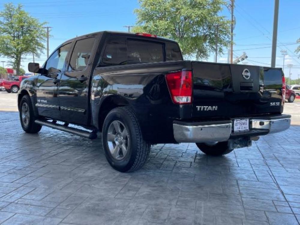 2010 Galaxy Black Metallic /Charcoal Cloth Interior Nissan Titan SE Crew Cab 2WD SWB (1N6BA0ED1AN) with an 5.6L V8 DOHC 32V FFV engine, 5-Speed Automatic transmission, located at 900 South McDonald Street, McKinney, TX, 75069, (972) 529-2992, 33.189335, -96.613403 - Tow package, Spray on bedliner, Tool box, Power seat, CD player, Back up sensors - Photo #3