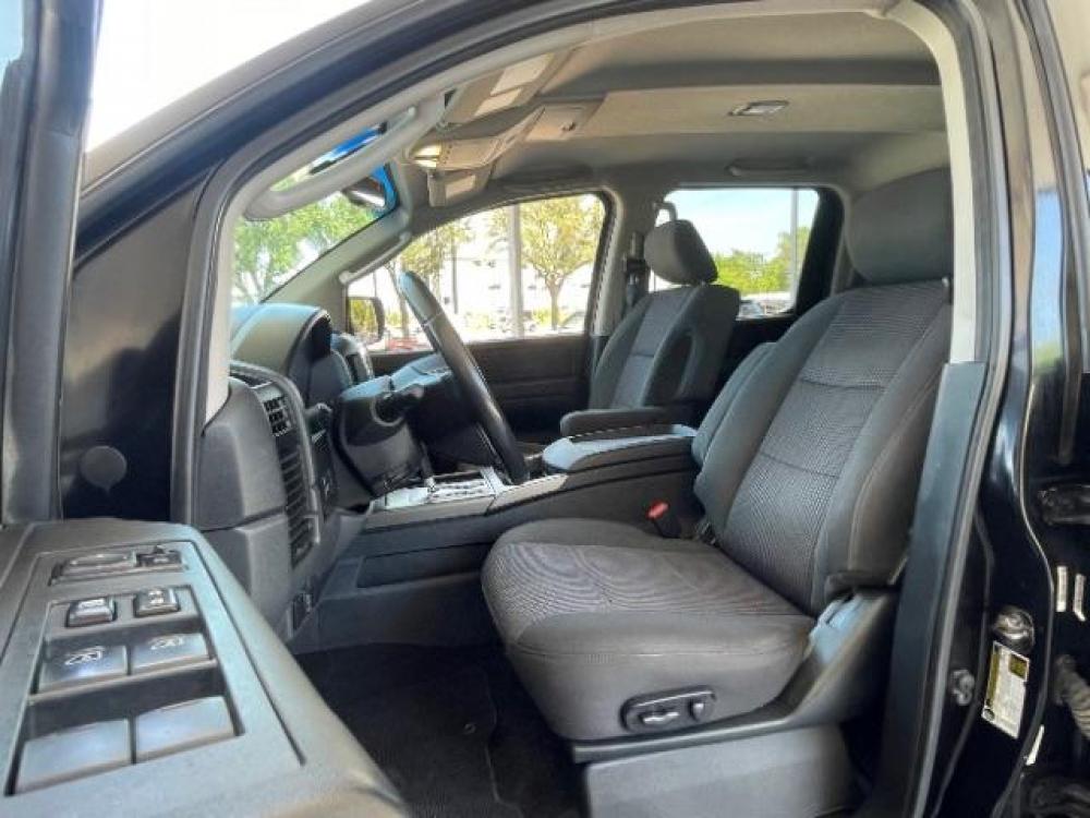 2010 Galaxy Black Metallic /Charcoal Cloth Interior Nissan Titan SE Crew Cab 2WD SWB (1N6BA0ED1AN) with an 5.6L V8 DOHC 32V FFV engine, 5-Speed Automatic transmission, located at 900 South McDonald Street, McKinney, TX, 75069, (972) 529-2992, 33.189335, -96.613403 - Tow package, Spray on bedliner, Tool box, Power seat, CD player, Back up sensors - Photo #11