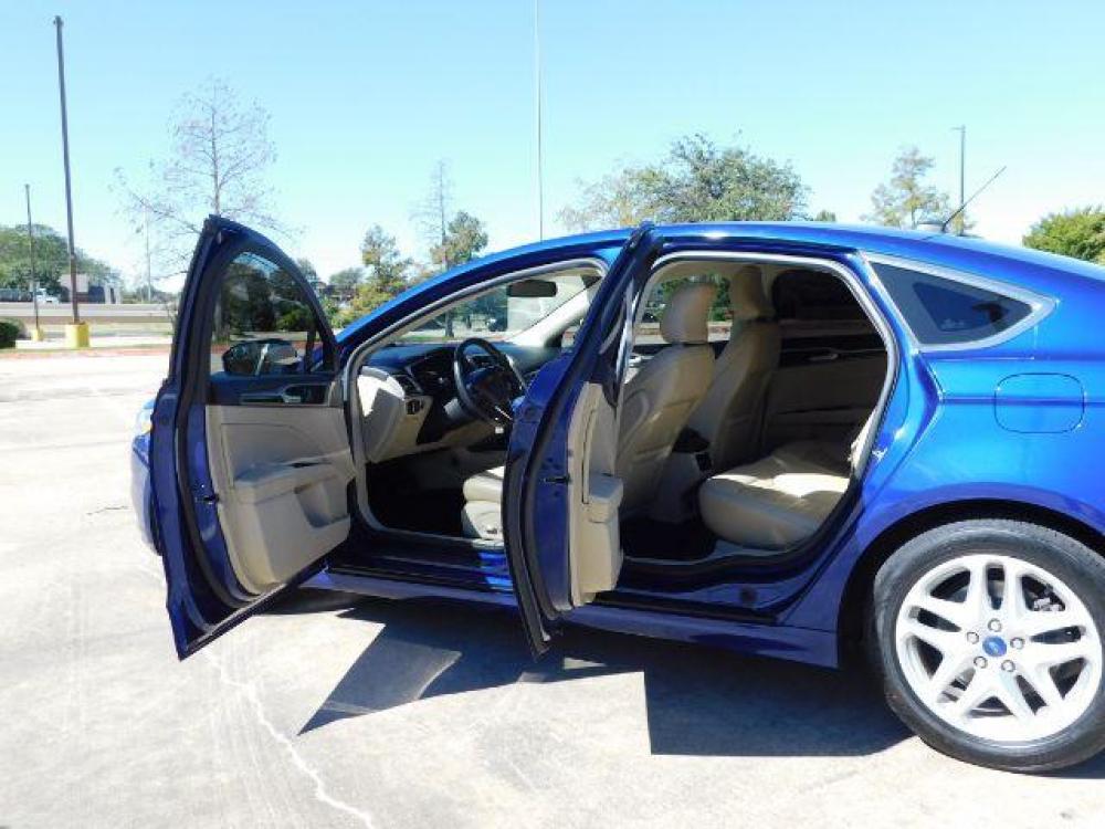 2016 Blue /Dune, leather Ford Fusion SE (3FA6P0HD1GR) with an 1.5L L4 DOHC 16V engine, 6-Speed Automatic transmission, located at 900 South McDonald Street, McKinney, TX, 75069, (972) 529-2992, 33.189335, -96.613403 - Photo #11