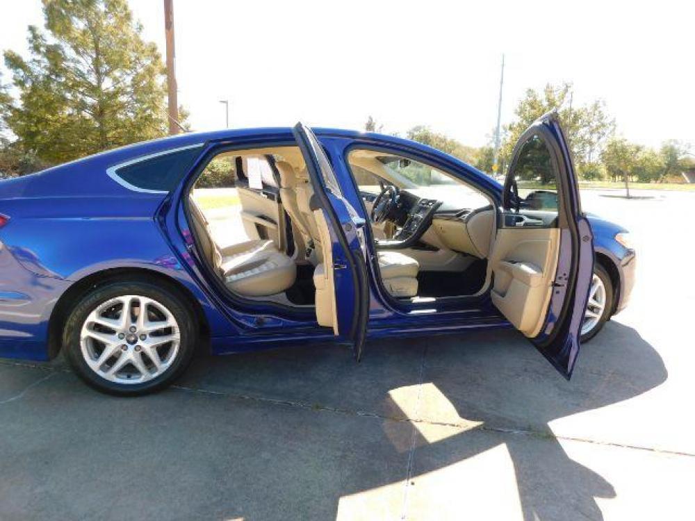 2016 Blue /Dune, leather Ford Fusion SE (3FA6P0HD1GR) with an 1.5L L4 DOHC 16V engine, 6-Speed Automatic transmission, located at 900 South McDonald Street, McKinney, TX, 75069, (972) 529-2992, 33.189335, -96.613403 - Photo #12