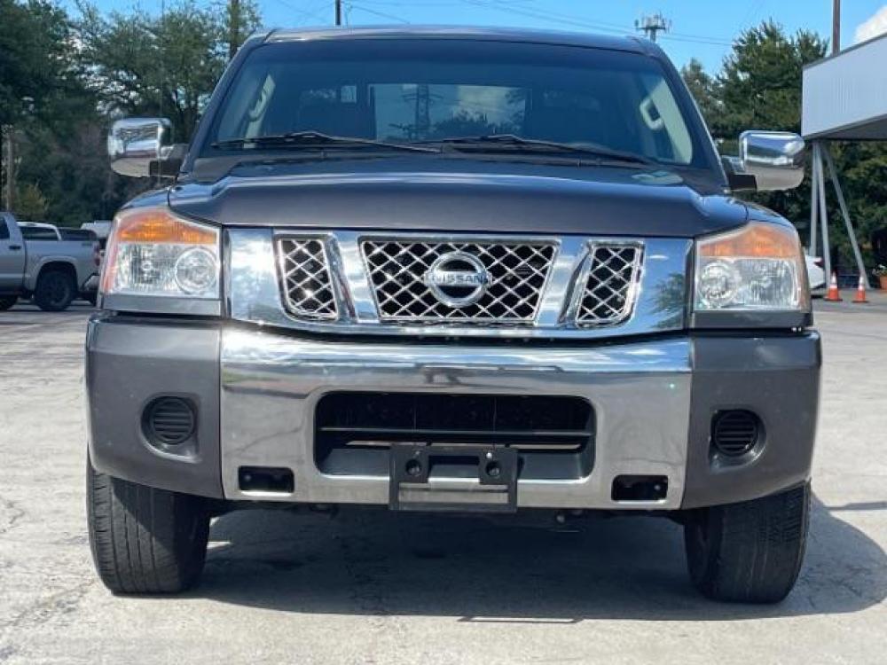 2012 Smoke Metallic /Charcoal Cloth Inter Nissan Titan SV Crew Cab 4WD (1N6BA0EK9CN) with an 5.6L V8 DOHC 32V FFV engine, 5-Speed Automatic transmission, located at 900 South McDonald Street, McKinney, TX, 75069, (972) 529-2992, 33.189335, -96.613403 - 6 Disc CD player, Step bars, Power rear window, Bed extender, Bedliner, Tow package - Photo #2