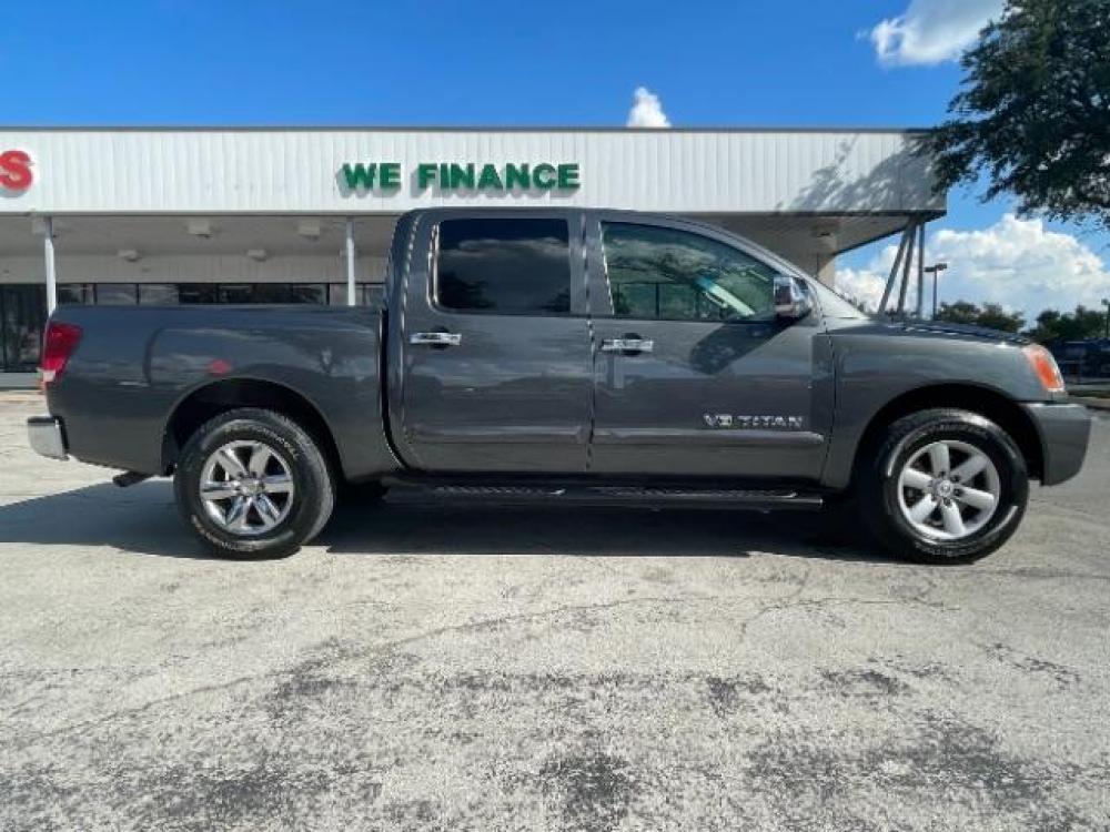 2012 Smoke Metallic /Charcoal Cloth Inter Nissan Titan SV Crew Cab 4WD (1N6BA0EK9CN) with an 5.6L V8 DOHC 32V FFV engine, 5-Speed Automatic transmission, located at 900 South McDonald Street, McKinney, TX, 75069, (972) 529-2992, 33.189335, -96.613403 - 6 Disc CD player, Step bars, Power rear window, Bed extender, Bedliner, Tow package - Photo #8