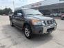 2012 Smoke Metallic /Charcoal Cloth Inter Nissan Titan SV Crew Cab 4WD (1N6BA0EK9CN) with an 5.6L V8 DOHC 32V FFV engine, 5-Speed Automatic transmission, located at 900 South McDonald Street, McKinney, TX, 75069, (972) 529-2992, 33.189335, -96.613403- Photo#1