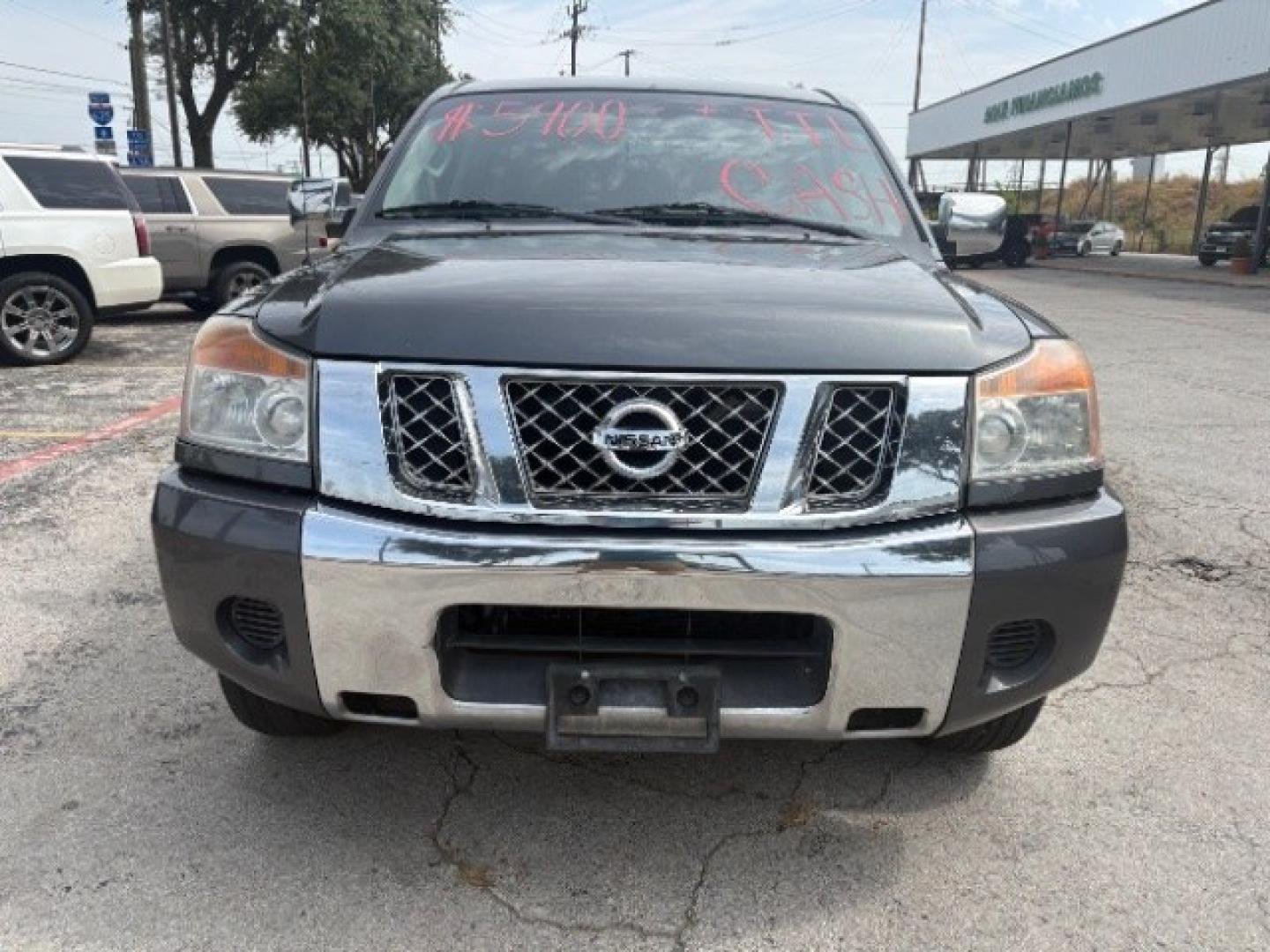 2012 Smoke Metallic /Charcoal Cloth Inter Nissan Titan SV Crew Cab 4WD (1N6BA0EK9CN) with an 5.6L V8 DOHC 32V FFV engine, 5-Speed Automatic transmission, located at 900 South McDonald Street, McKinney, TX, 75069, (972) 529-2992, 33.189335, -96.613403- Photo#2