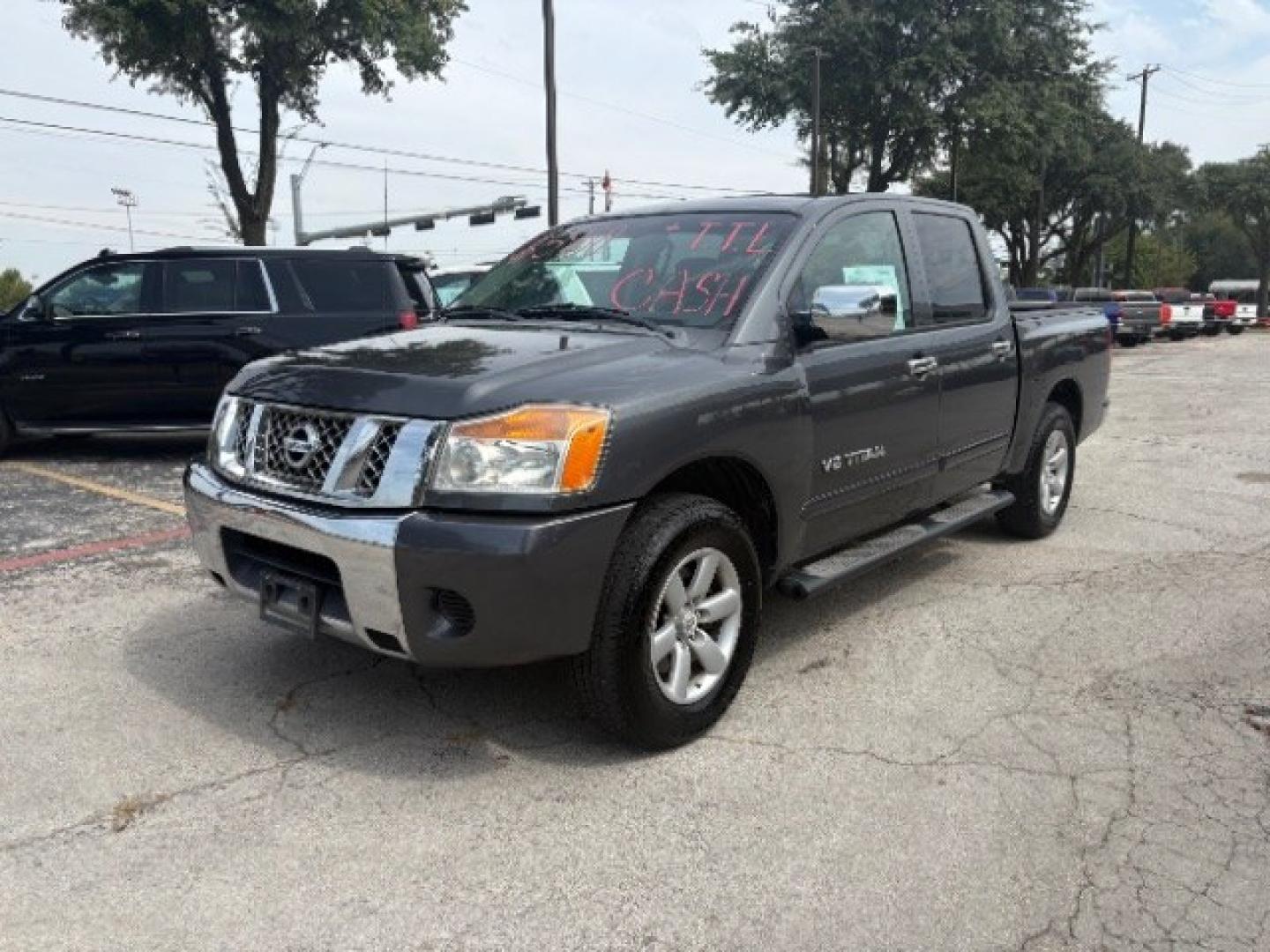 2012 Smoke Metallic /Charcoal Cloth Inter Nissan Titan SV Crew Cab 4WD (1N6BA0EK9CN) with an 5.6L V8 DOHC 32V FFV engine, 5-Speed Automatic transmission, located at 900 South McDonald Street, McKinney, TX, 75069, (972) 529-2992, 33.189335, -96.613403- Photo#4
