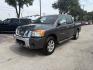 2012 Smoke Metallic /Charcoal Cloth Inter Nissan Titan SV Crew Cab 4WD (1N6BA0EK9CN) with an 5.6L V8 DOHC 32V FFV engine, 5-Speed Automatic transmission, located at 900 South McDonald Street, McKinney, TX, 75069, (972) 529-2992, 33.189335, -96.613403- Photo#4