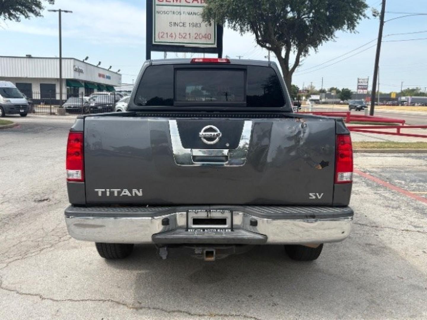2012 Smoke Metallic /Charcoal Cloth Inter Nissan Titan SV Crew Cab 4WD (1N6BA0EK9CN) with an 5.6L V8 DOHC 32V FFV engine, 5-Speed Automatic transmission, located at 900 South McDonald Street, McKinney, TX, 75069, (972) 529-2992, 33.189335, -96.613403- Photo#5
