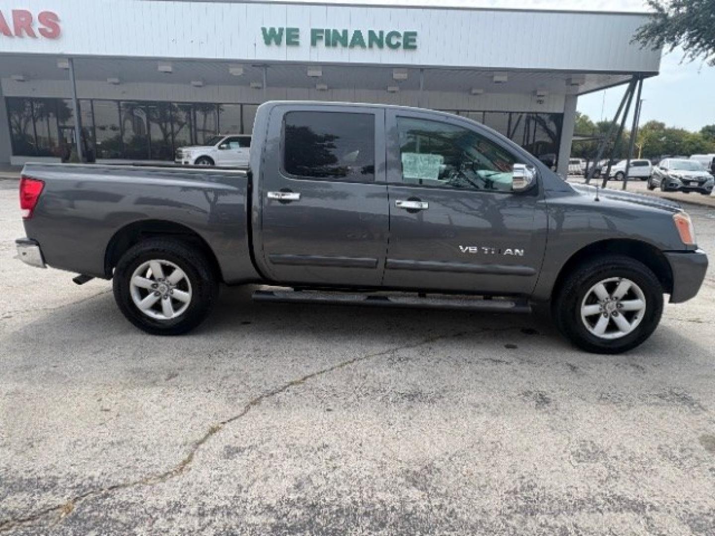 2012 Smoke Metallic /Charcoal Cloth Inter Nissan Titan SV Crew Cab 4WD (1N6BA0EK9CN) with an 5.6L V8 DOHC 32V FFV engine, 5-Speed Automatic transmission, located at 900 South McDonald Street, McKinney, TX, 75069, (972) 529-2992, 33.189335, -96.613403- Photo#7