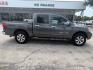 2012 Smoke Metallic /Charcoal Cloth Inter Nissan Titan SV Crew Cab 4WD (1N6BA0EK9CN) with an 5.6L V8 DOHC 32V FFV engine, 5-Speed Automatic transmission, located at 900 South McDonald Street, McKinney, TX, 75069, (972) 529-2992, 33.189335, -96.613403- Photo#7