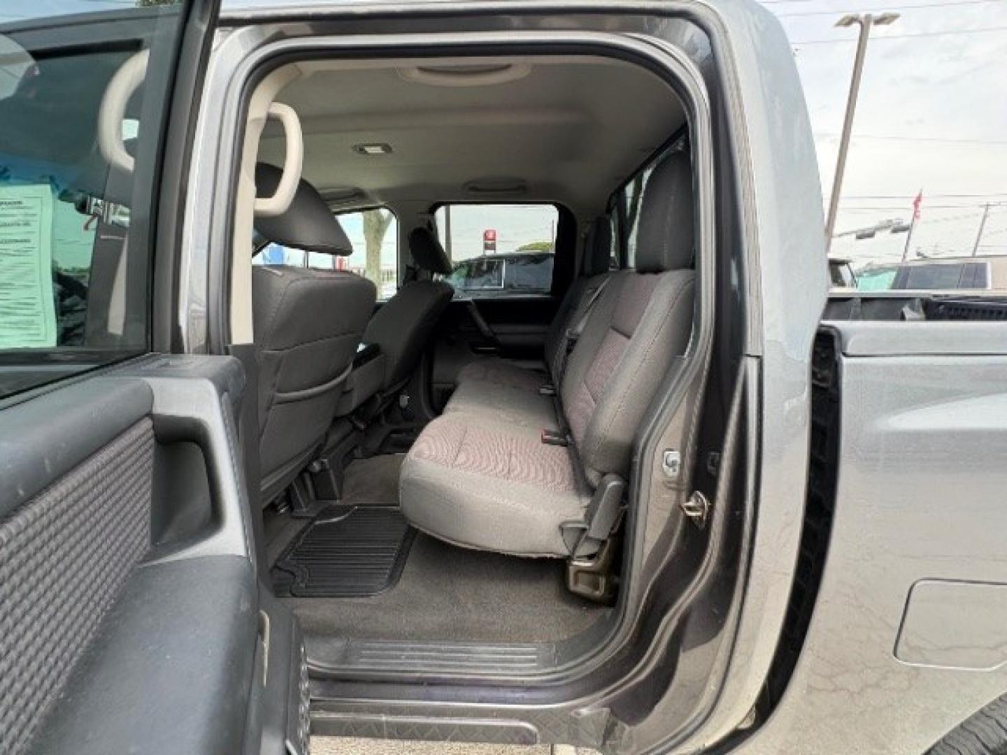 2012 Smoke Metallic /Charcoal Cloth Inter Nissan Titan SV Crew Cab 4WD (1N6BA0EK9CN) with an 5.6L V8 DOHC 32V FFV engine, 5-Speed Automatic transmission, located at 900 South McDonald Street, McKinney, TX, 75069, (972) 529-2992, 33.189335, -96.613403- Photo#10