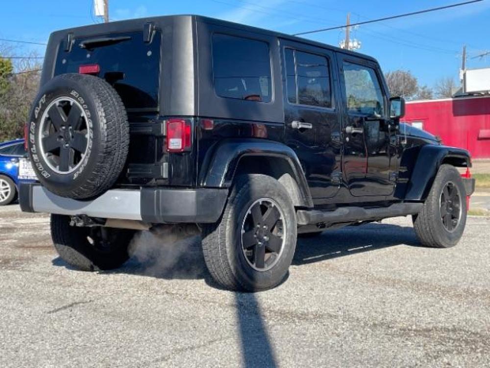 2008 Black with Black Har /Dark Slate Gray/Medi Jeep Wrangler Unlimited Sahara 4WD (1J8GA59118L) with an 3.8L V6 OHV 12V engine, located at 900 South McDonald Street, McKinney, TX, 75069, (972) 529-2992, 33.189335, -96.613403 - Photo #5