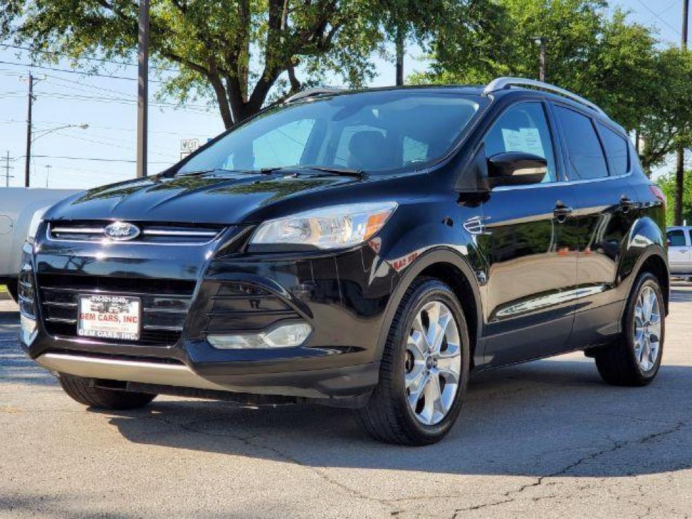2016 Black /Charcoal Black, leather Ford Escape Titanium FWD (1FMCU0J92GU) with an 2.0L L4 DOHC 16V engine, 6-Speed Automatic transmission, located at 900 South McDonald Street, McKinney, TX, 75069, (972) 529-2992, 33.189335, -96.613403 - Photo #2