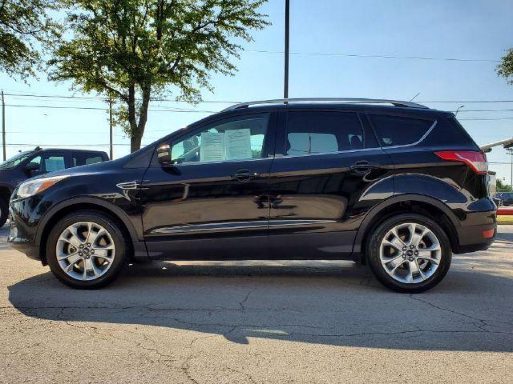 2016 Black /Charcoal Black, leather Ford Escape Titanium FWD (1FMCU0J92GU) with an 2.0L L4 DOHC 16V engine, 6-Speed Automatic transmission, located at 900 South McDonald Street, McKinney, TX, 75069, (972) 529-2992, 33.189335, -96.613403 - Photo #3