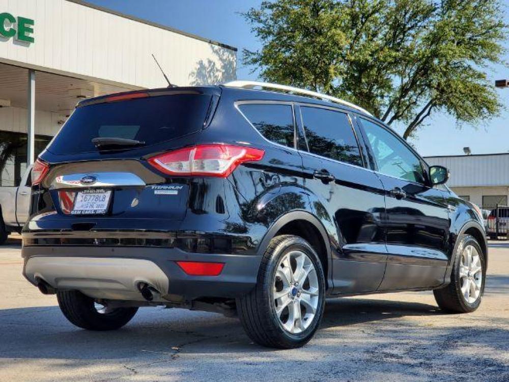 2016 Black /Charcoal Black, leather Ford Escape Titanium FWD (1FMCU0J92GU) with an 2.0L L4 DOHC 16V engine, 6-Speed Automatic transmission, located at 900 South McDonald Street, McKinney, TX, 75069, (972) 529-2992, 33.189335, -96.613403 - Photo #6