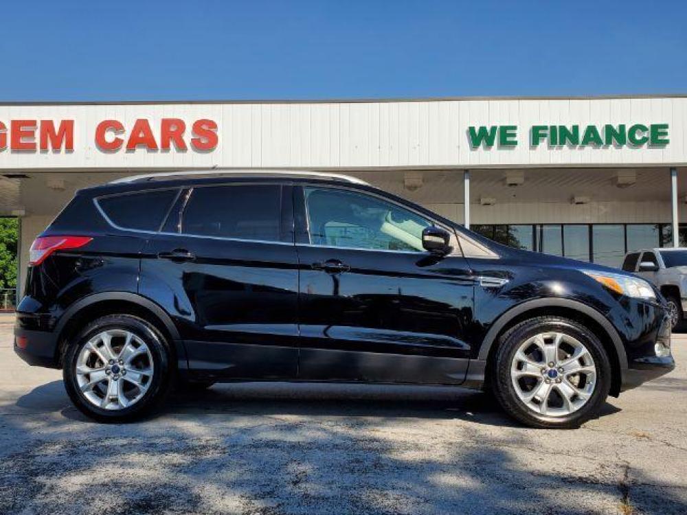 2016 Black /Charcoal Black, leather Ford Escape Titanium FWD (1FMCU0J92GU) with an 2.0L L4 DOHC 16V engine, 6-Speed Automatic transmission, located at 900 South McDonald Street, McKinney, TX, 75069, (972) 529-2992, 33.189335, -96.613403 - Photo #7