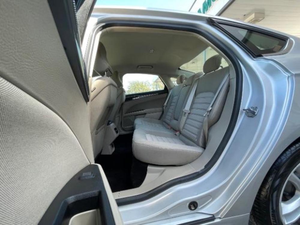 2018 Ingot Silver Metallic /Medium Light Stone, cloth Ford Fusion SE (3FA6P0H79JR) with an 2.5L L4 DOHC 16V engine, 6-Speed Automatic transmission, located at 900 South McDonald Street, McKinney, TX, 75069, (972) 529-2992, 33.189335, -96.613403 - Back up camera, Back up sensors, CD player, Power seats - Photo #10