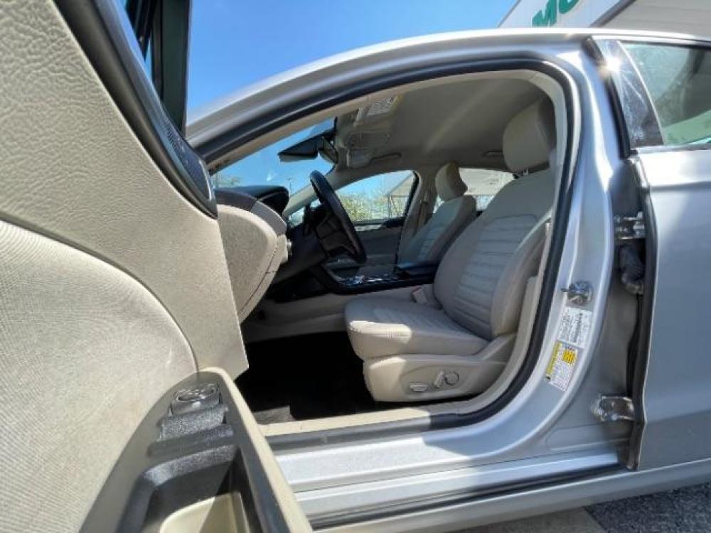 2018 Ingot Silver Metallic /Medium Light Stone, cloth Ford Fusion SE (3FA6P0H79JR) with an 2.5L L4 DOHC 16V engine, 6-Speed Automatic transmission, located at 900 South McDonald Street, McKinney, TX, 75069, (972) 529-2992, 33.189335, -96.613403 - Back up camera, Back up sensors, CD player, Power seats - Photo #12