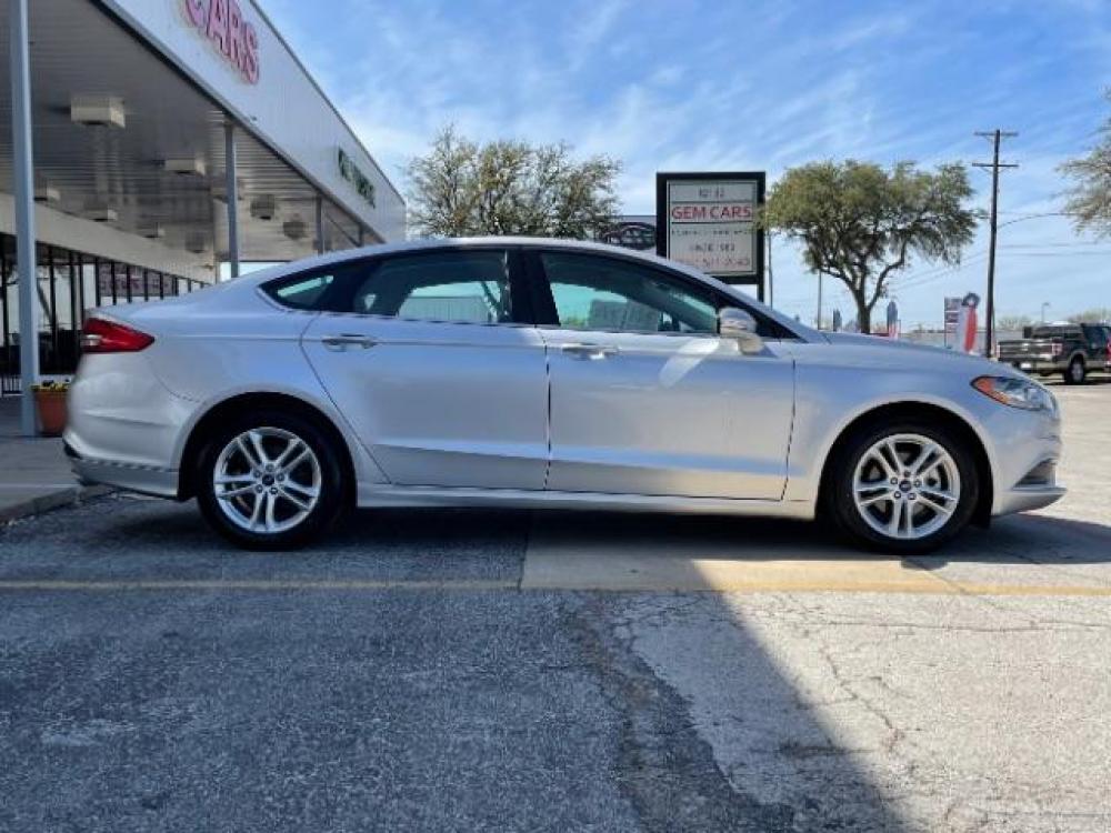 2018 Ingot Silver Metallic /Medium Light Stone, cloth Ford Fusion SE (3FA6P0H79JR) with an 2.5L L4 DOHC 16V engine, 6-Speed Automatic transmission, located at 900 South McDonald Street, McKinney, TX, 75069, (972) 529-2992, 33.189335, -96.613403 - Back up camera, Back up sensors, CD player, Power seats - Photo #7