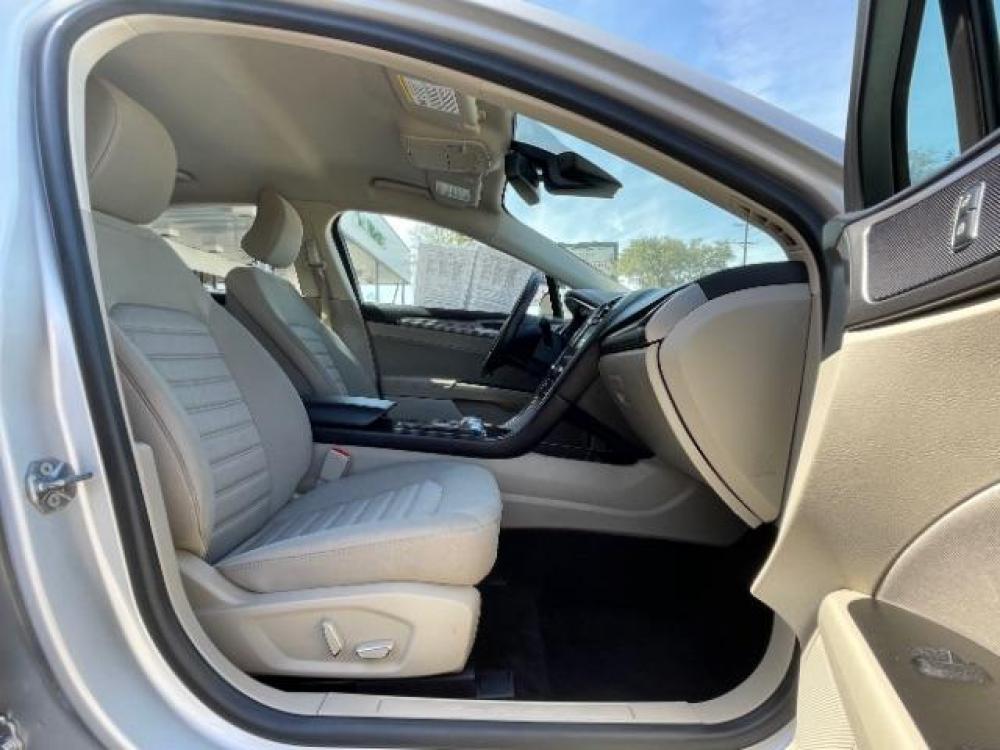 2018 Ingot Silver Metallic /Medium Light Stone, cloth Ford Fusion SE (3FA6P0H79JR) with an 2.5L L4 DOHC 16V engine, 6-Speed Automatic transmission, located at 900 South McDonald Street, McKinney, TX, 75069, (972) 529-2992, 33.189335, -96.613403 - Back up camera, Back up sensors, CD player, Power seats - Photo #8