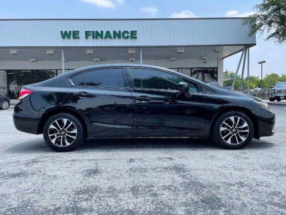 2015 Crystal Black Pearl /Gray, cloth Honda Civic EX Sedan CVT (19XFB2F83FE) with an 1.8L L4 SOHC 16V engine, Continuously Variable Transmission transmission, located at 900 South McDonald Street, McKinney, TX, 75069, (972) 529-2992, 33.189335, -96.613403 - Back up camera, CD player - Photo #7