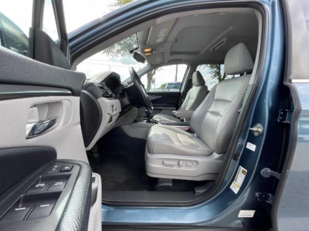 2016 Blue /Gray, leather Honda Pilot EXL 2WD (5FNYF5H88GB) with an 3.5L V6 SOHC 24V engine, 6-Speed Automatic transmission, located at 900 South McDonald Street, McKinney, TX, 75069, (972) 529-2992, 33.189335, -96.613403 - Photo #12