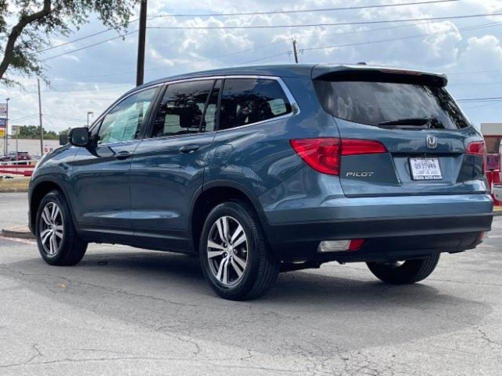 2016 Blue /Gray, leather Honda Pilot EXL 2WD (5FNYF5H88GB) with an 3.5L V6 SOHC 24V engine, 6-Speed Automatic transmission, located at 900 South McDonald Street, McKinney, TX, 75069, (972) 529-2992, 33.189335, -96.613403 - Photo #4