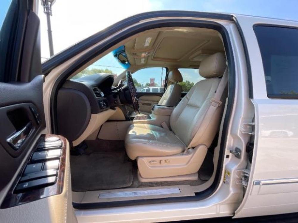2013 Summit White /Cocoa/Light Cashmere Leather Interior GMC Yukon Denali XL 2WD (1GKS1MEF5DR) with an 6.2L V8 OHV 16V engine, 6-Speed Automatic transmission, located at 900 South McDonald Street, McKinney, TX, 75069, (972) 529-2992, 33.189335, -96.613403 - Back up camera, Back up sensors, Third row seating, Captain''''''''s chairs, Running boards, Heated Seats, Cooled seats, DVD player, Power seats, Sunroof, CD player, Power liftgate - Photo #12