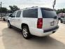 2014 Summit White /Light Cashmere/Dk Ca Chevrolet Suburban LS 1500 2WD (1GNSCHE00ER) with an 5.3L V8 OHV 16V FFV engine, 6-Speed Automatic transmission, located at 900 South McDonald Street, McKinney, TX, 75069, (972) 529-2992, 33.189335, -96.613403- Photo#4
