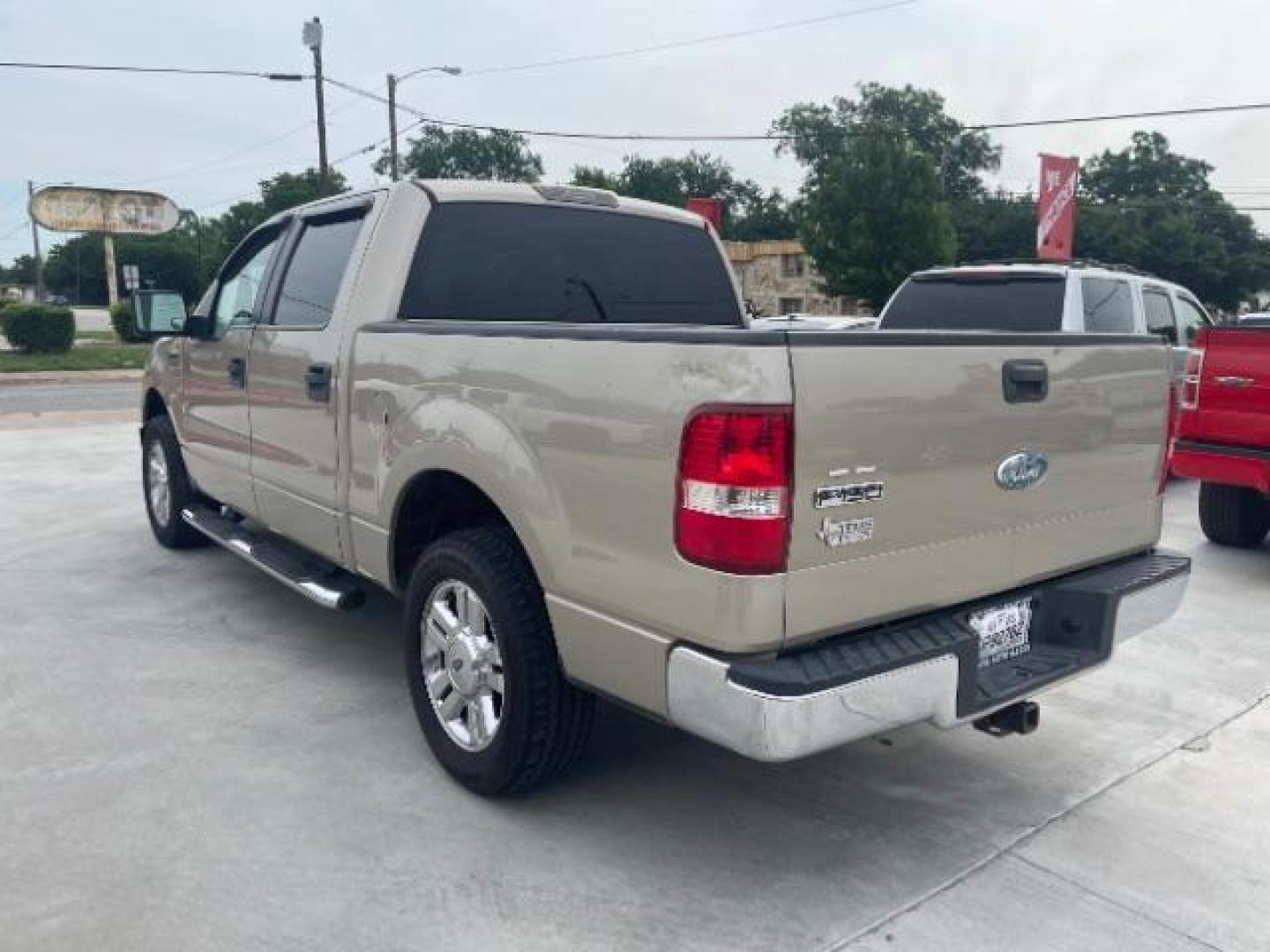 2008 Pueblo Gold Metallic /Tan Cloth Interior Ford F-150 XLT SuperCrew Short (1FTRW12W38F) with an 4.6L V8 SOHC 16V engine, 4-Speed Automatic transmission, located at 900 South McDonald Street, McKinney, TX, 75069, (972) 529-2992, 33.189335, -96.613403 - Photo#2