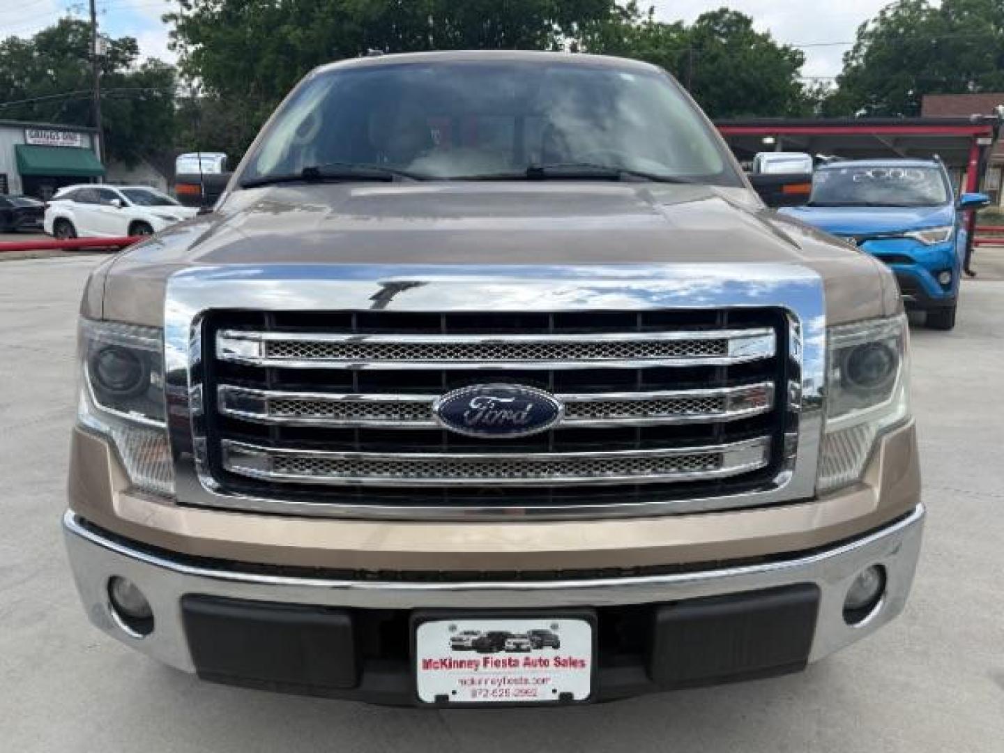 2013 Gold Ford F-150 Lariat SuperCrew 6.5 (1FTFW1CF7DK) with an 5.0L V8 engine, 6-Speed Automatic transmission, located at 900 South McDonald Street, McKinney, TX, 75069, (972) 529-2992, 33.189335, -96.613403 - Photo#1