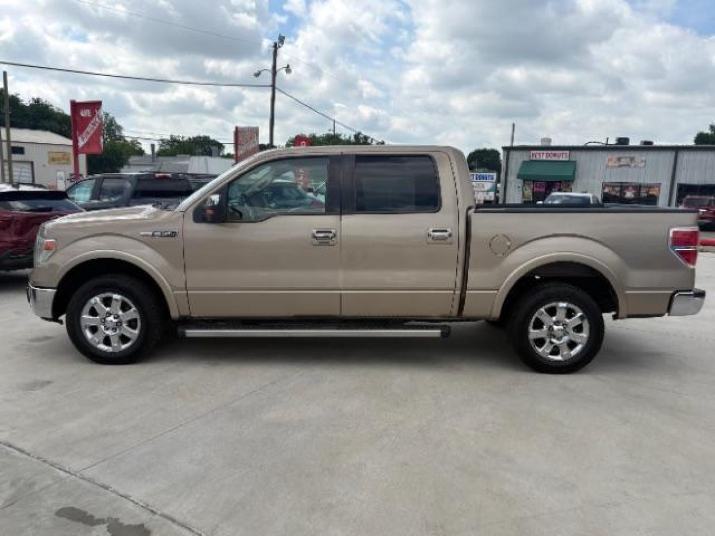 2013 Gold Ford F-150 Lariat SuperCrew 6.5 (1FTFW1CF7DK) with an 5.0L V8 engine, 6-Speed Automatic transmission, located at 900 South McDonald Street, McKinney, TX, 75069, (972) 529-2992, 33.189335, -96.613403 - Photo#3