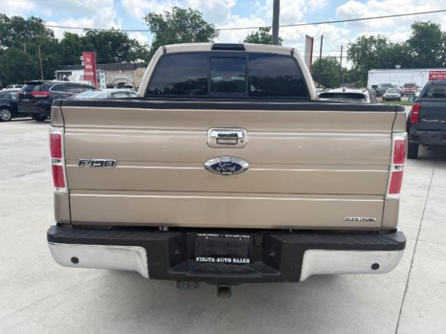2013 Gold Ford F-150 Lariat SuperCrew 6.5 (1FTFW1CF7DK) with an 5.0L V8 engine, 6-Speed Automatic transmission, located at 900 South McDonald Street, McKinney, TX, 75069, (972) 529-2992, 33.189335, -96.613403 - Photo#7