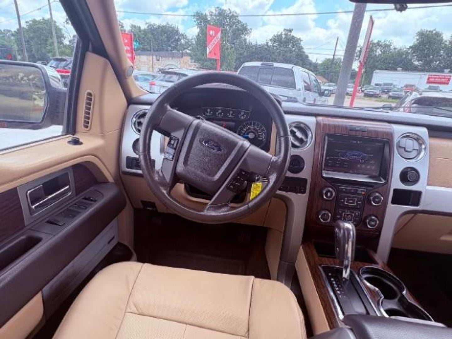 2013 Gold Ford F-150 Lariat SuperCrew 6.5 (1FTFW1CF7DK) with an 5.0L V8 engine, 6-Speed Automatic transmission, located at 900 South McDonald Street, McKinney, TX, 75069, (972) 529-2992, 33.189335, -96.613403 - Photo#12
