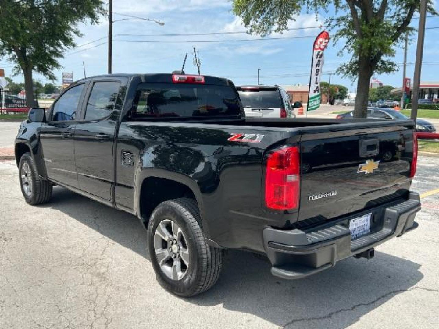 2015 Black /Jet Black Chevrolet Colorado Z71 (1GCGSCE32F1) with an 3.6L V-6 gasoline direct injection engine, Automatic transmission, located at 900 South McDonald Street, McKinney, TX, 75069, (972) 529-2992, 33.189335, -96.613403 - Photo#4