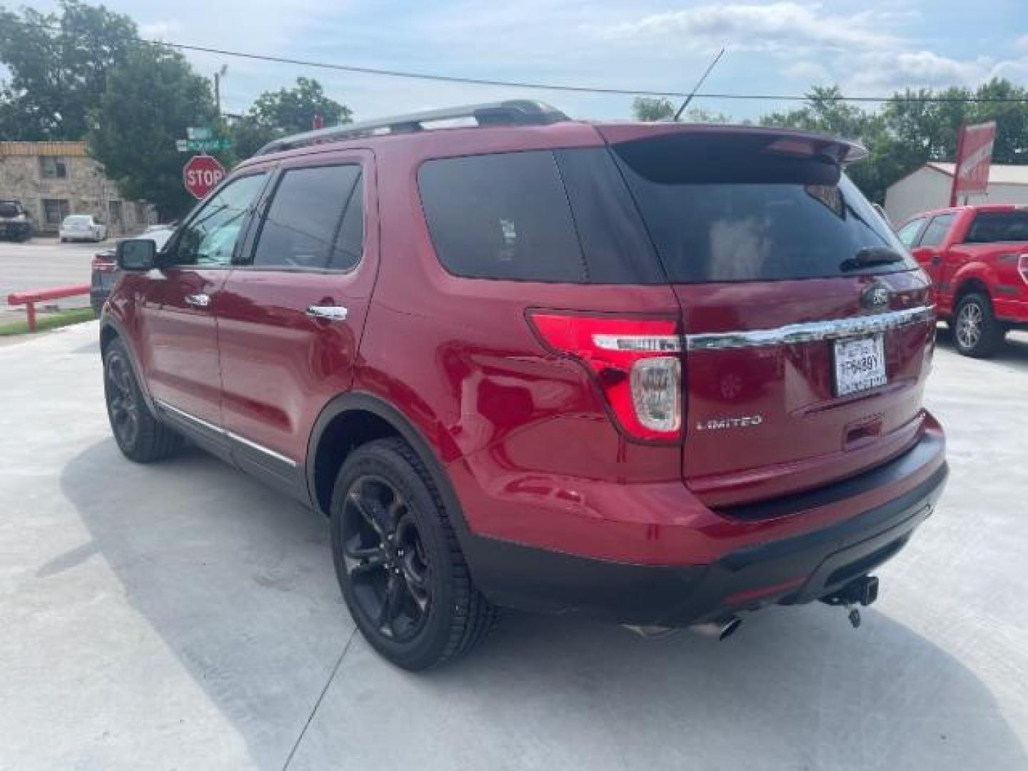 2015 Ruby Red Metallic Ti /Medium Light Stone, Ford Explorer Limited 4WD (1FM5K8F85FG) with an 3.5L V6 DOHC 24V engine, 6-Speed Automatic transmission, located at 900 South McDonald Street, McKinney, TX, 75069, (972) 529-2992, 33.189335, -96.613403 - Photo#2