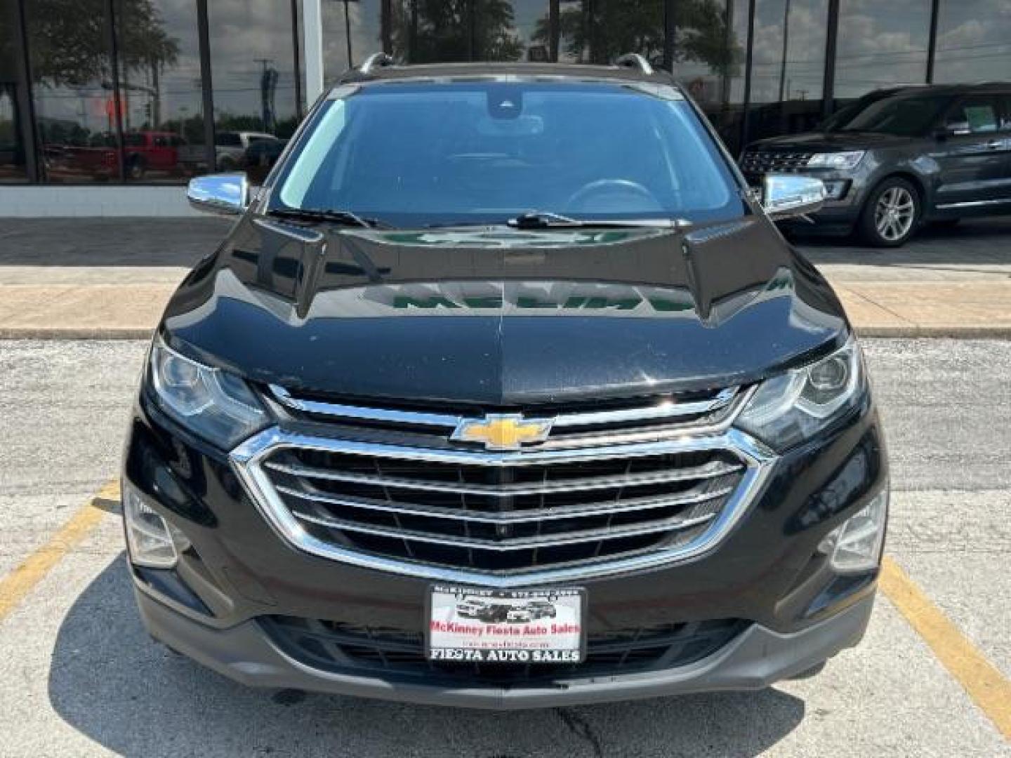 2018 Mosaic Black Metallic /Jet Black Chevrolet Equinox Premier (2GNAXMEV1J6) with an 1.5L I-4 gasoline direct injection engine, Automatic transmission, located at 900 South McDonald Street, McKinney, TX, 75069, (972) 529-2992, 33.189335, -96.613403 - Photo#1