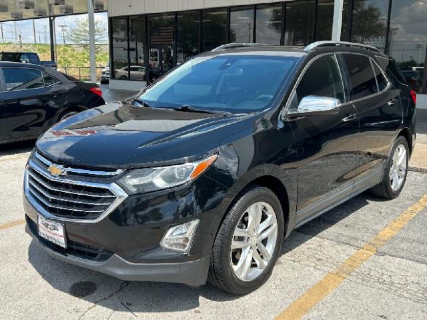 2018 Mosaic Black Metallic /Jet Black Chevrolet Equinox Premier (2GNAXMEV1J6) with an 1.5L I-4 gasoline direct injection engine, Automatic transmission, located at 900 South McDonald Street, McKinney, TX, 75069, (972) 529-2992, 33.189335, -96.613403 - Photo#2