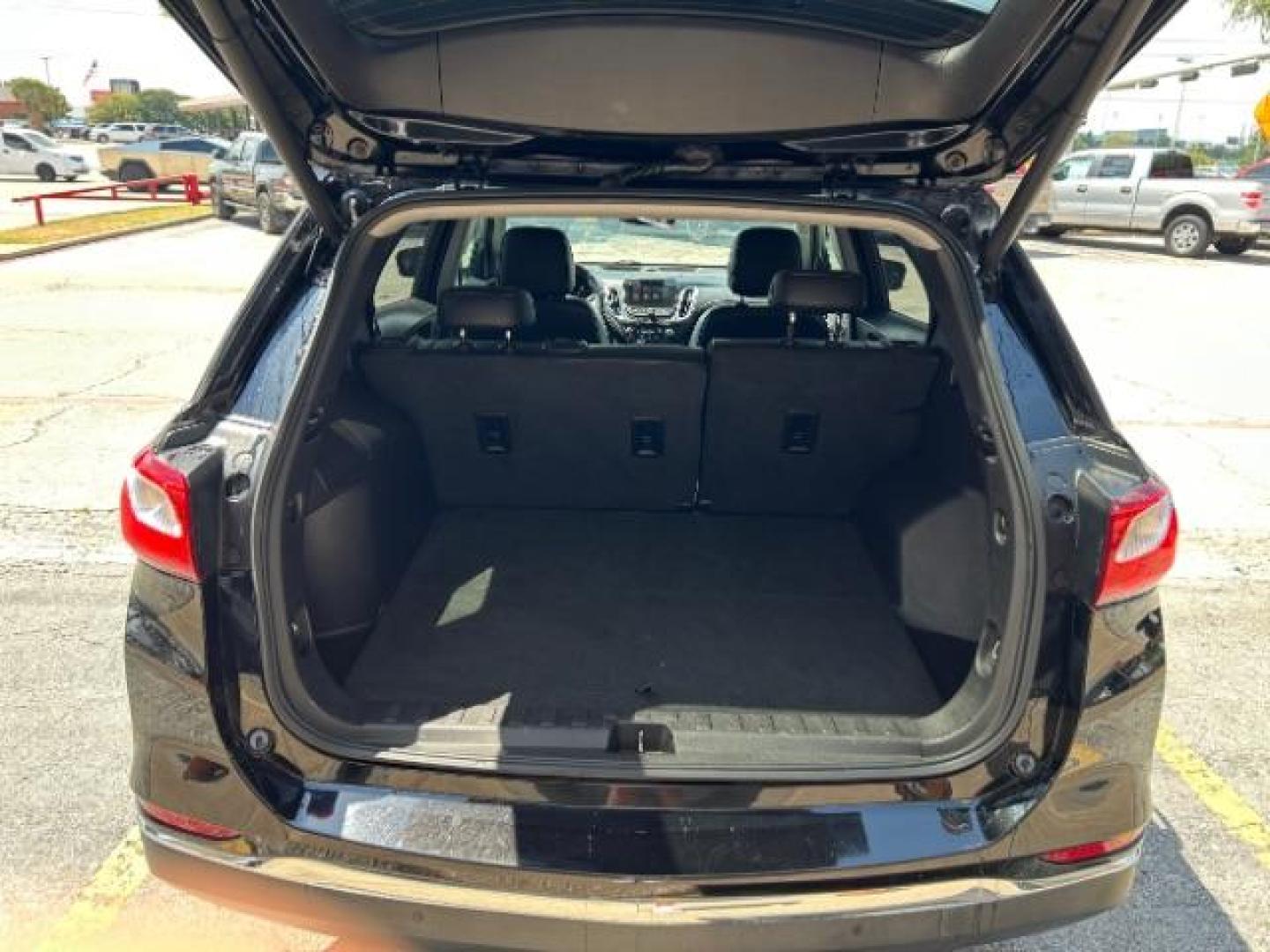 2018 Mosaic Black Metallic /Jet Black Chevrolet Equinox Premier (2GNAXMEV1J6) with an 1.5L I-4 gasoline direct injection engine, Automatic transmission, located at 900 South McDonald Street, McKinney, TX, 75069, (972) 529-2992, 33.189335, -96.613403 - Photo#7