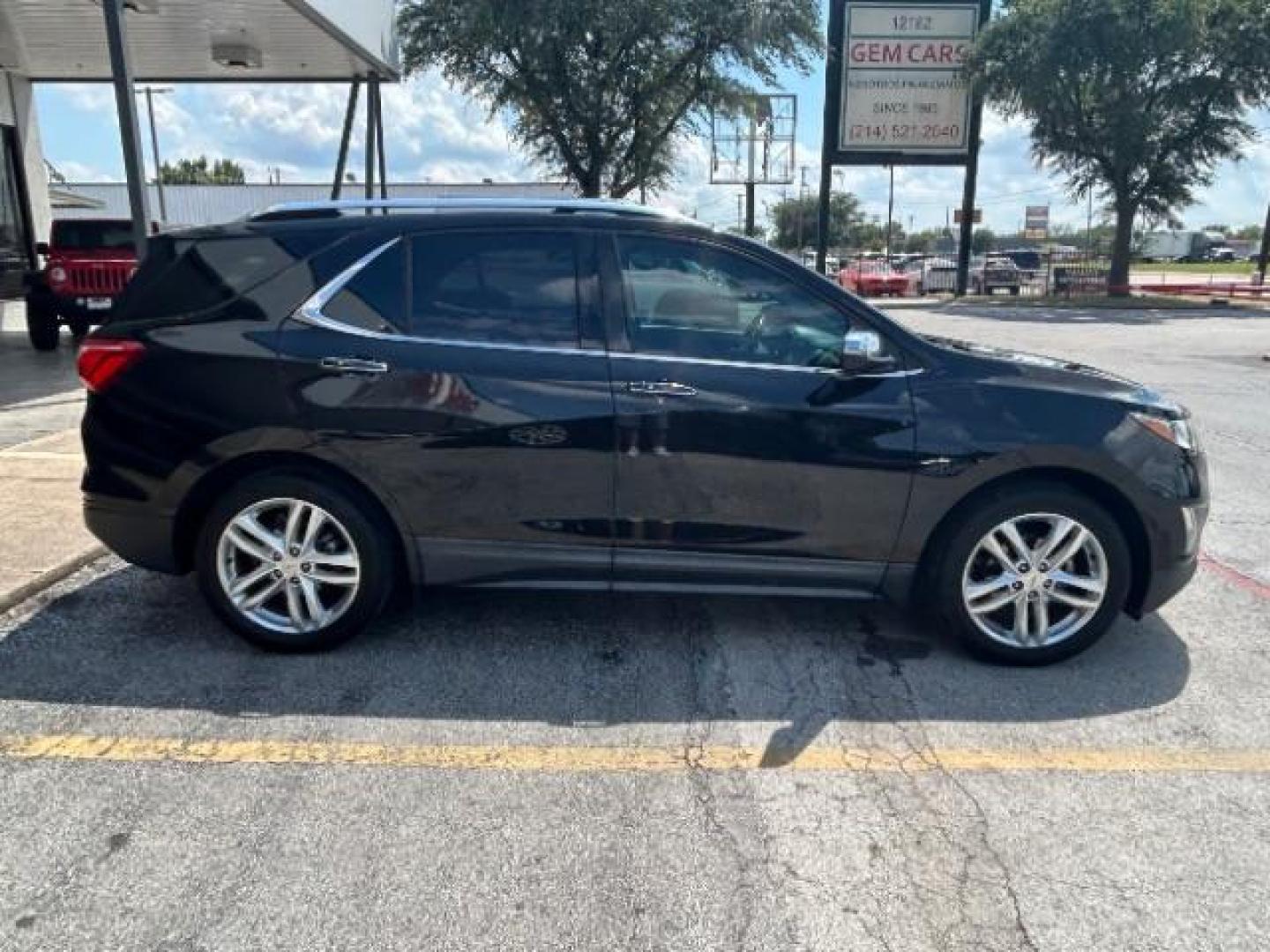2018 Mosaic Black Metallic /Jet Black Chevrolet Equinox Premier (2GNAXMEV1J6) with an 1.5L I-4 gasoline direct injection engine, Automatic transmission, located at 900 South McDonald Street, McKinney, TX, 75069, (972) 529-2992, 33.189335, -96.613403 - Photo#8