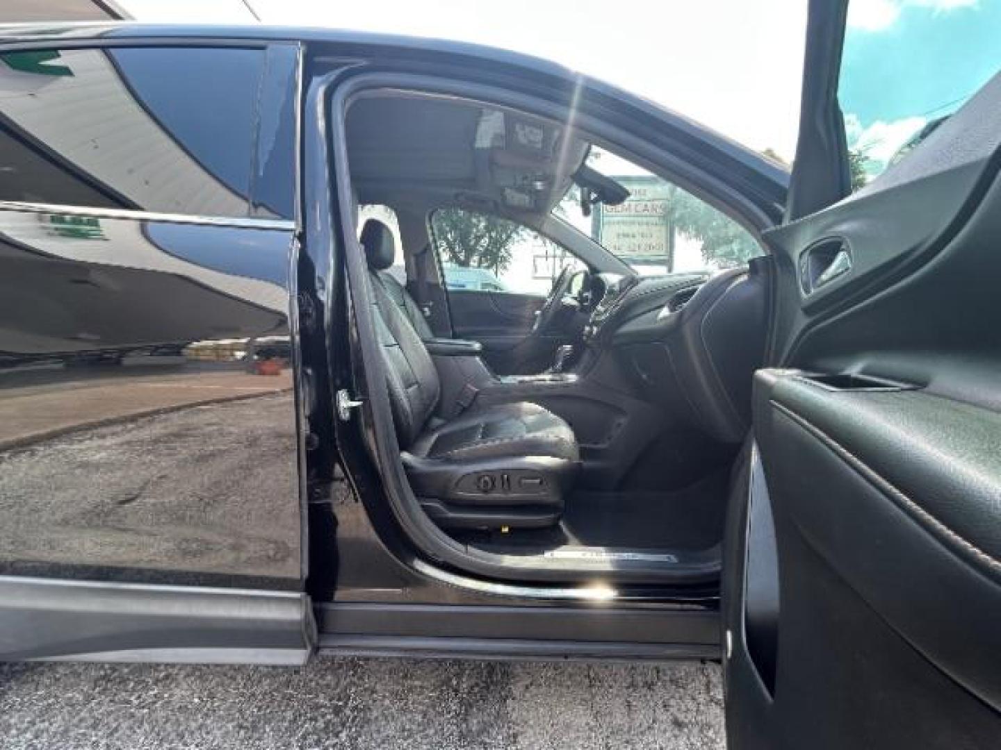 2018 Mosaic Black Metallic /Jet Black Chevrolet Equinox Premier (2GNAXMEV1J6) with an 1.5L I-4 gasoline direct injection engine, Automatic transmission, located at 900 South McDonald Street, McKinney, TX, 75069, (972) 529-2992, 33.189335, -96.613403 - Photo#9