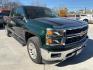 2015 Rainforest Green Met /Dark Ash Seats w/Jet Chevrolet Silverado 1500 LT Crew Cab 4WD (3GCUKREC3FG) with an 5.3L V8 OHV 16V engine, 6-Speed Automatic transmission, located at 900 South McDonald Street, McKinney, TX, 75069, (972) 529-2992, 33.189335, -96.613403 - Photo#0
