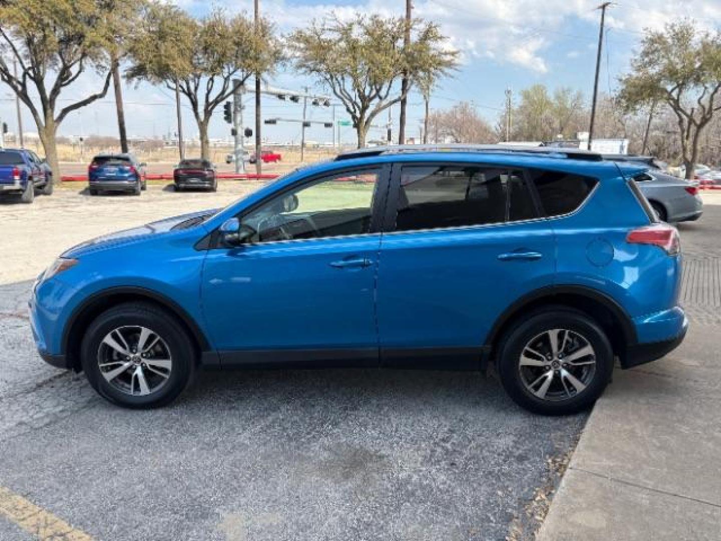2017 Electric Storm Blue /Ash Toyota RAV4 XLE (JTMWFREV6HJ) with an 2.5L I-4 DOHC engine, Automatic transmission, located at 900 South McDonald Street, McKinney, TX, 75069, (972) 529-2992, 33.189335, -96.613403 - Photo#3
