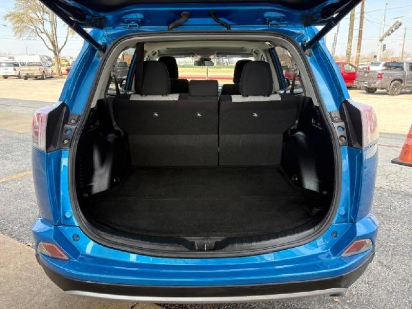 2017 Electric Storm Blue /Ash Toyota RAV4 XLE (JTMWFREV6HJ) with an 2.5L I-4 DOHC engine, Automatic transmission, located at 900 South McDonald Street, McKinney, TX, 75069, (972) 529-2992, 33.189335, -96.613403 - Photo#6