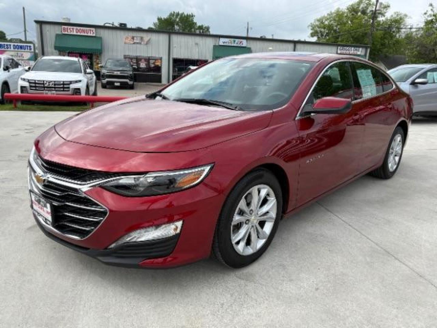2024 Radiant Red Tintcoat /Jet Black Chevrolet Malibu FWD 1LT (1G1ZD5STXRF) with an ECOTEC 1.5L I-4 gasoline direct injection engine, Automatic transmission, located at 900 South McDonald Street, McKinney, TX, 75069, (972) 529-2992, 33.189335, -96.613403 - Photo#2
