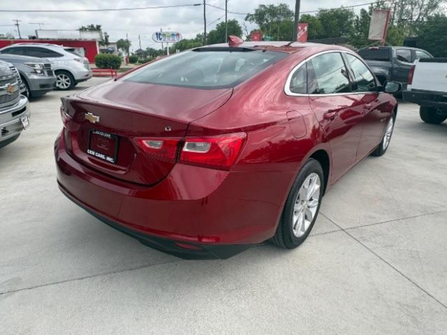 2024 Radiant Red Tintcoat /Jet Black Chevrolet Malibu FWD 1LT (1G1ZD5STXRF) with an ECOTEC 1.5L I-4 gasoline direct injection engine, Automatic transmission, located at 900 South McDonald Street, McKinney, TX, 75069, (972) 529-2992, 33.189335, -96.613403 - Photo#4