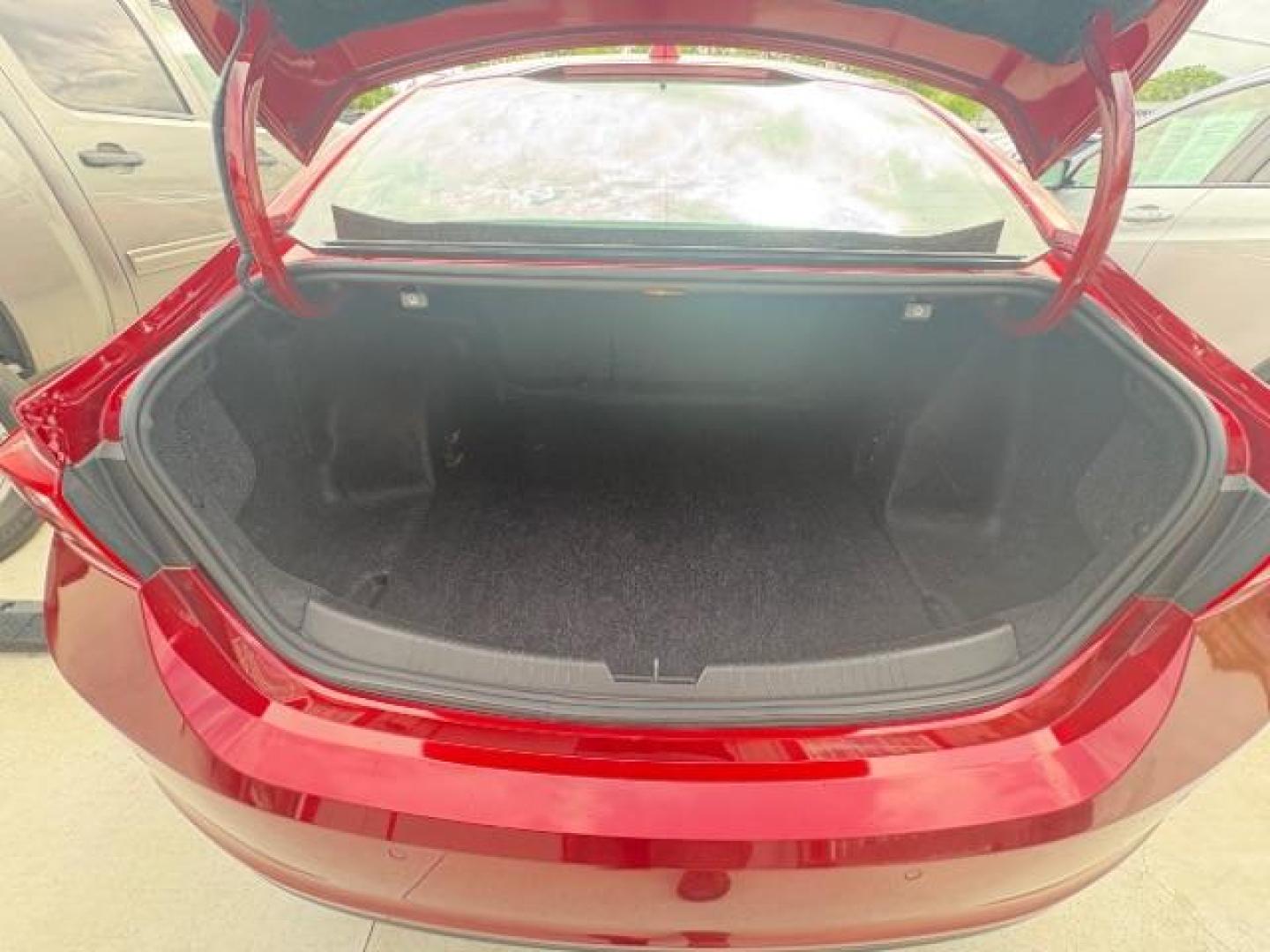 2024 Radiant Red Tintcoat /Jet Black Chevrolet Malibu FWD 1LT (1G1ZD5STXRF) with an ECOTEC 1.5L I-4 gasoline direct injection engine, Automatic transmission, located at 900 South McDonald Street, McKinney, TX, 75069, (972) 529-2992, 33.189335, -96.613403 - Photo#15
