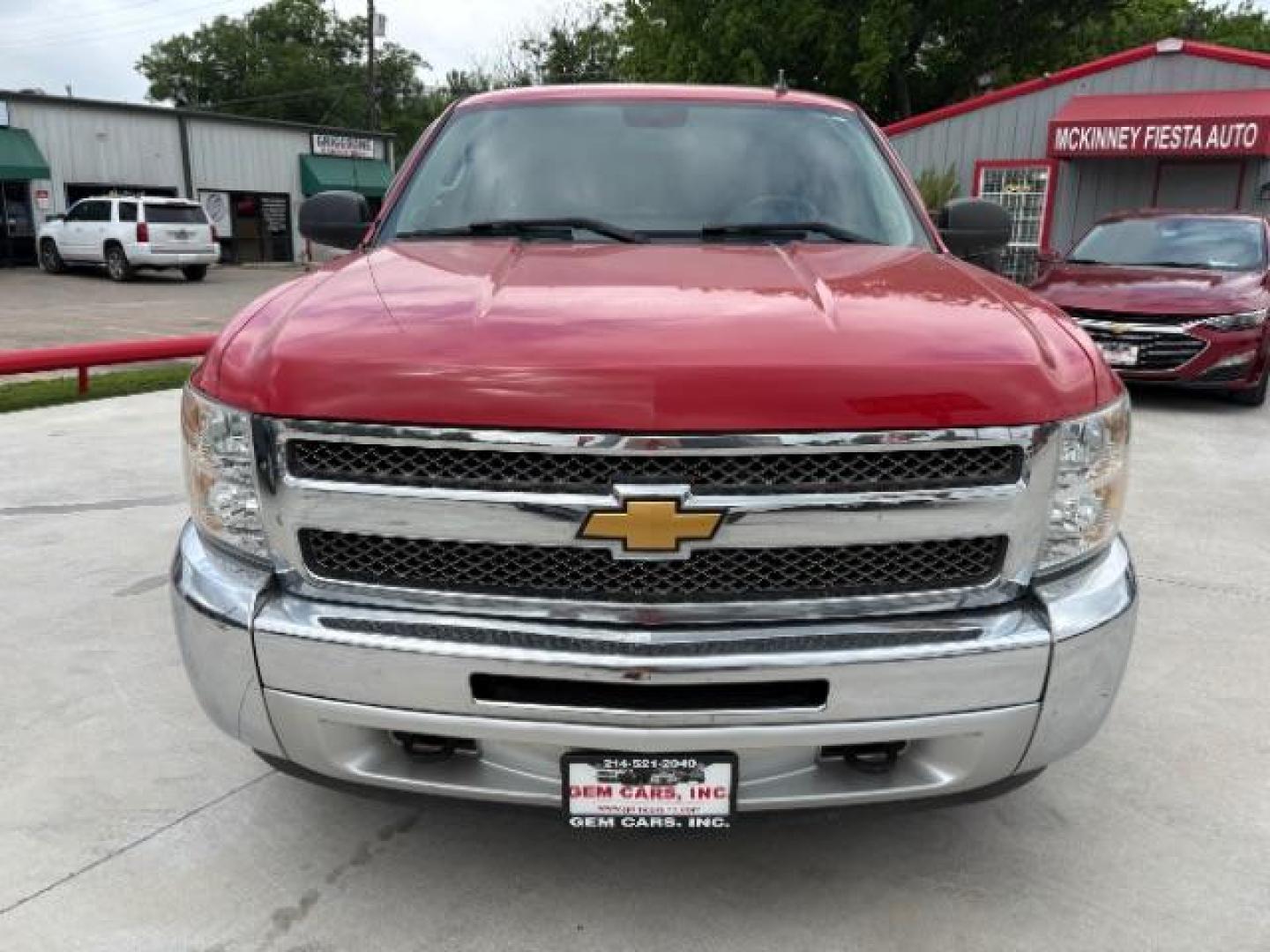 2013 Victory Red /Ebony Cloth Interior Chevrolet Silverado 1500 LT Ext. Cab 4WD (1GCRKSE78DZ) with an 5.3L V8 OHV 16V FFV engine, 6-Speed Automatic transmission, located at 900 South McDonald Street, McKinney, TX, 75069, (972) 529-2992, 33.189335, -96.613403 - Photo#1