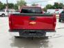 2013 Victory Red /Ebony Cloth Interior Chevrolet Silverado 1500 LT Ext. Cab 4WD (1GCRKSE78DZ) with an 5.3L V8 OHV 16V FFV engine, 6-Speed Automatic transmission, located at 900 South McDonald Street, McKinney, TX, 75069, (972) 529-2992, 33.189335, -96.613403 - Photo#2