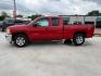 2013 Victory Red /Ebony Cloth Interior Chevrolet Silverado 1500 LT Ext. Cab 4WD (1GCRKSE78DZ) with an 5.3L V8 OHV 16V FFV engine, 6-Speed Automatic transmission, located at 900 South McDonald Street, McKinney, TX, 75069, (972) 529-2992, 33.189335, -96.613403 - Photo#4