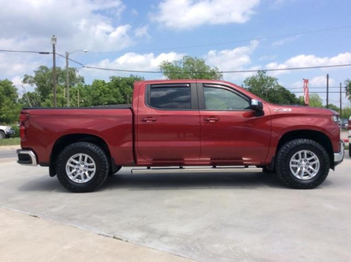 2019 Cajun Red Tintcoat /Gideon/Very Dark Atmosphere Chevrolet Silverado 1500 LT (1GCUYDED5KZ) with an EcoTec3 5.3L V-8 gasoline direct injection engine, located at 900 South McDonald Street, McKinney, TX, 75069, (972) 529-2992, 33.189335, -96.613403 - Photo#9
